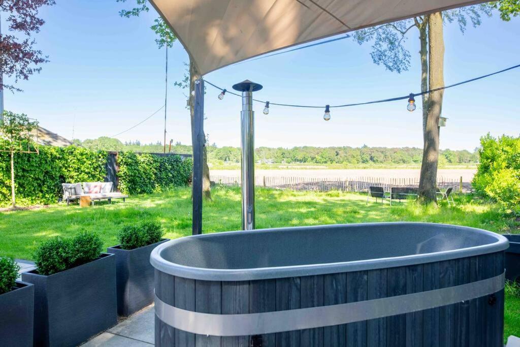 86, Bed & Outdoor Wellness - Sauna, Hottub, Icebath & Outdoor Shower Included! 奥斯特韦克 外观 照片